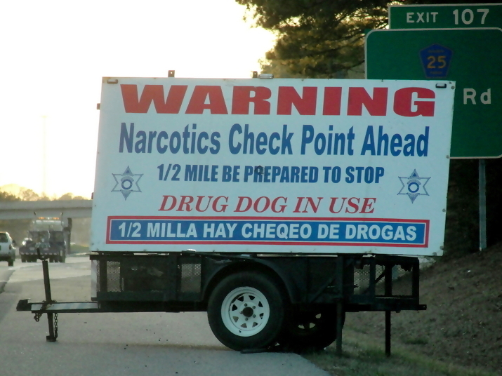WARNING // Narcotis Check point Ahead // 1/2 MILE BE PREPARED TO STOP // DRUG DOG IN USE // 1/2 MILLA HAY CHEQUO DE DROGAS